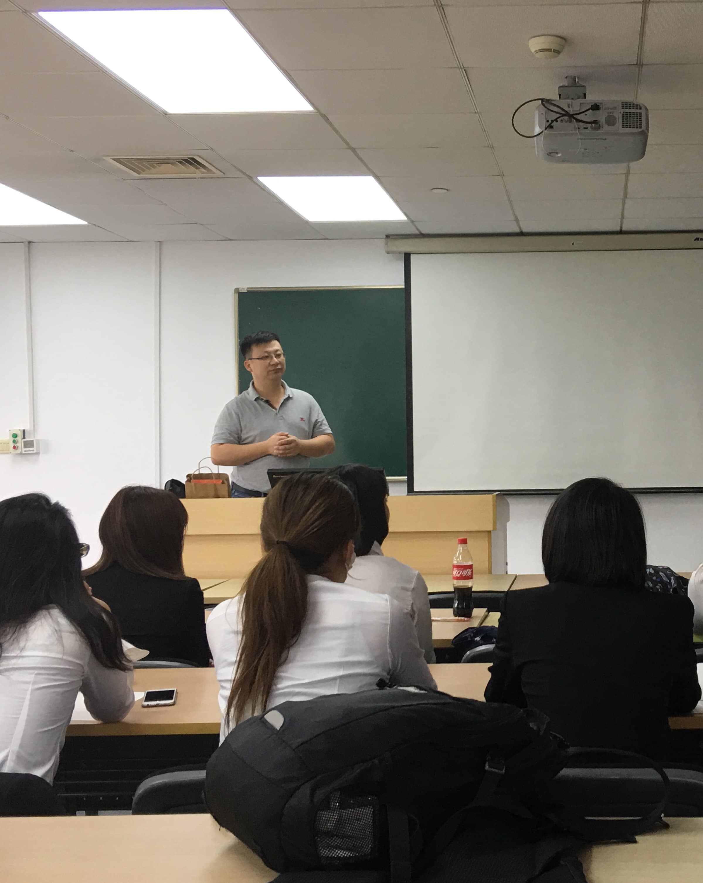Director of Teaching for the Acupuncture Department delivering a clinical lecture to medical staff and students.